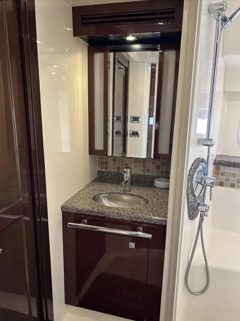 Slide: The Image of Luxurious bathroom in 2008 Sea Ray 47 Sedan Bridge yacht with modern fixtures. - 29