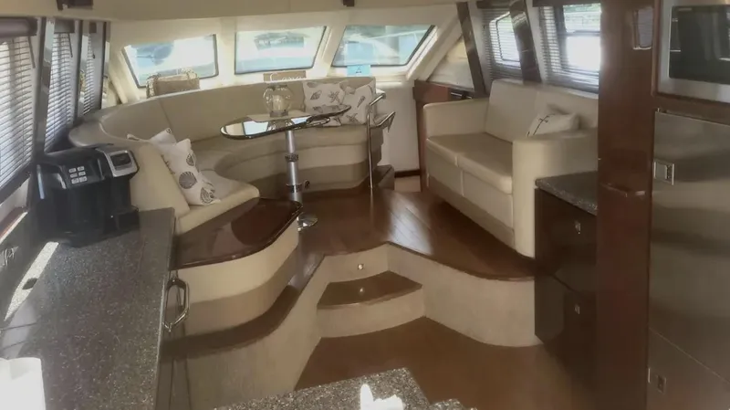 Slide: The Image of Luxurious interior of a 2008 Sea Ray 47 Sedan Bridge yacht with elegant seating and modern amenities. - 34