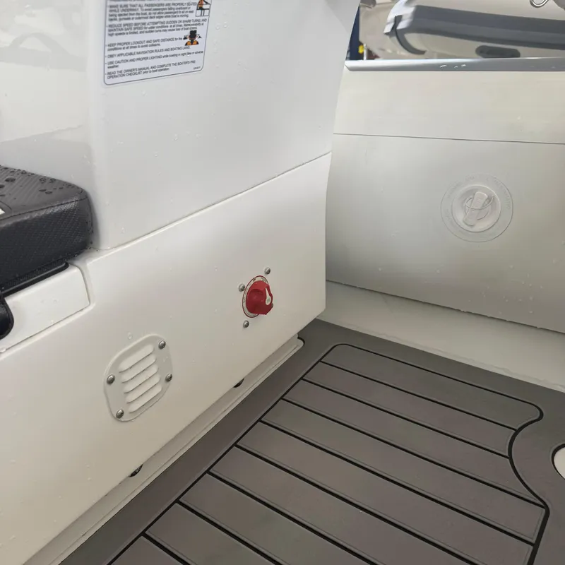 Slide: The Image of 2025 Highfield Sport 360 boat dashboard with steering wheel and control panel. - 6