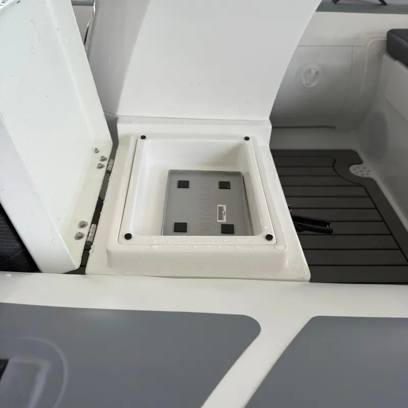 Slide: The Image of 2025 Highfield Sport 360 boat interior with cushioned seating and sleek design. - 8