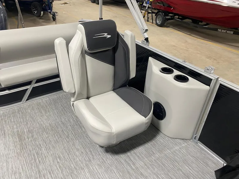 Slide: The Image of Luxury seating on 2025 Bennington 22SSB-SPS pontoon boat with cup holders. - 18