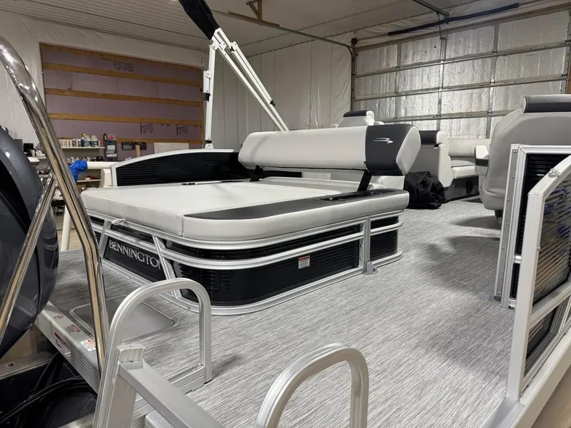Slide: The Image of 2025 Bennington 22SSB-SPS pontoon boat interior with sleek seating and modern design. - 21