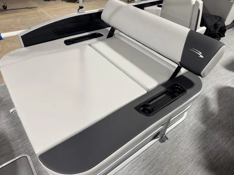 Slide: The Image of 2025 Bennington 22SSB-SPS boat seat with sleek design and integrated cup holders. - 22