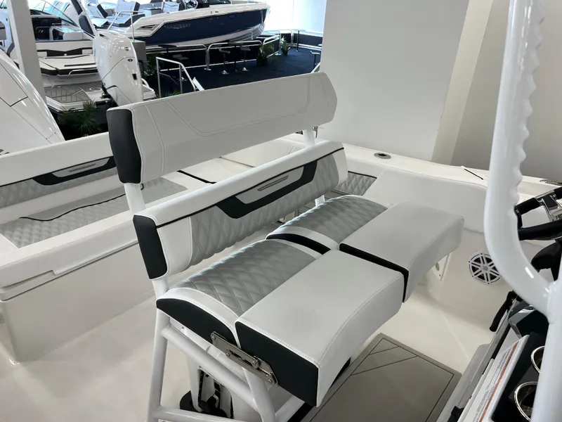 Slide: The Image of 2025 Blackfin 222CC boat interior with modern seating and sleek design. - 22