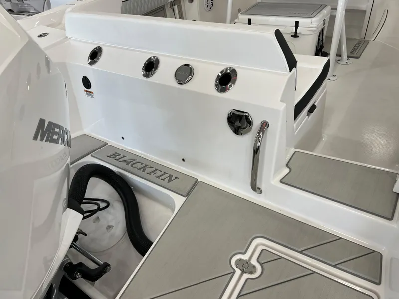 Slide: The Image of 2025 Blackfin 222CC boat interior with Mercury engine, featuring sleek design and modern amenities. - 5