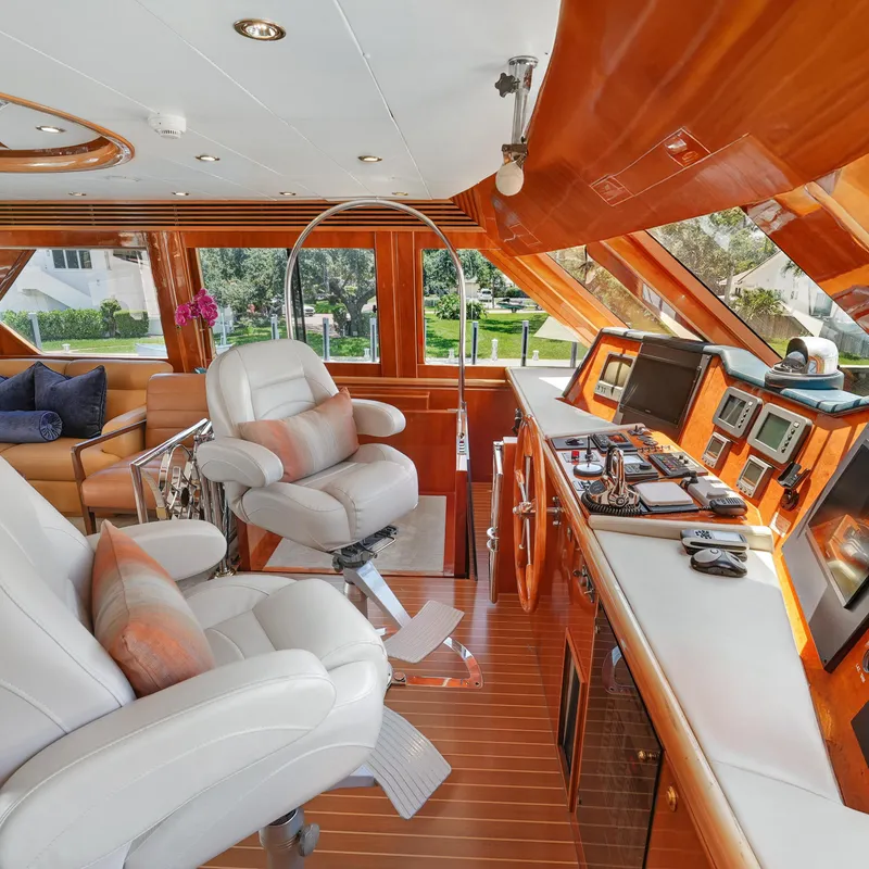 Slide: The Image of Luxurious 2003 Hargrave Sky Lounge yacht interior with plush seating and advanced navigation equipment. - 11