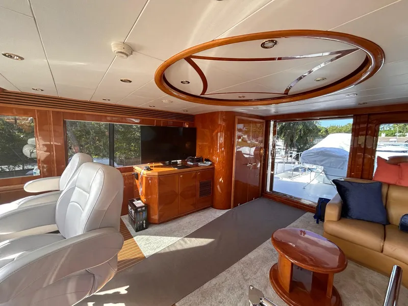 Slide: The Image of Luxurious interior of 2003 Hargrave Sky Lounge yacht with elegant wood finishes and modern seating. - 13