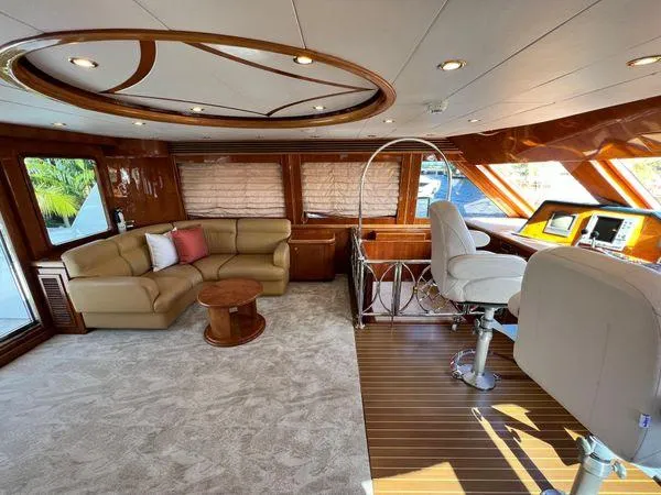 Slide: The Image of Luxurious interior of 2003 Hargrave Sky Lounge yacht with plush seating and elegant wood finishes. - 16