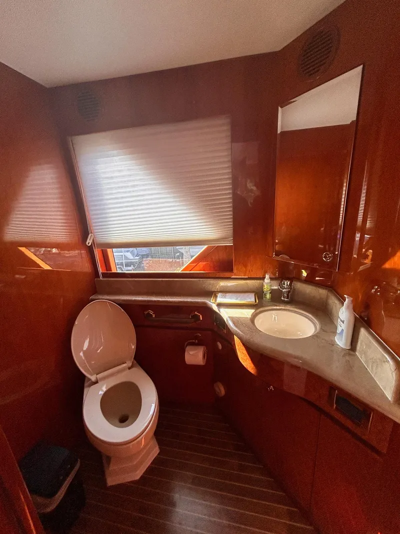 Slide: The Image of Luxurious bathroom in 2003 Hargrave Sky Lounge yacht with wood paneling and modern fixtures. - 17