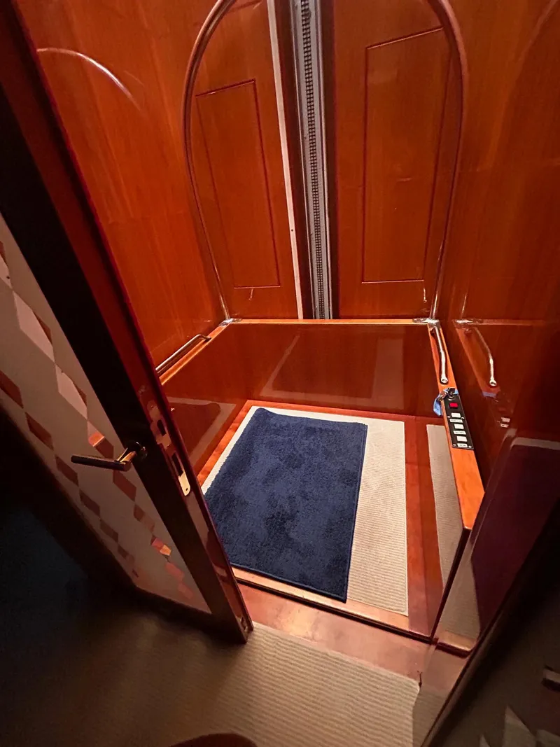 Slide: The Image of Luxurious interior of 2003 Hargrave Sky Lounge yacht with polished wood and elegant design. - 18