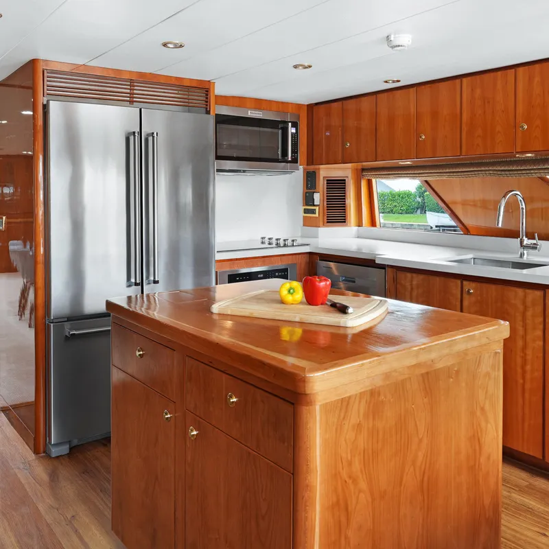 Slide: The Image of Luxurious kitchen in 2003 Hargrave Sky Lounge yacht with wooden cabinetry and modern appliances. - 20