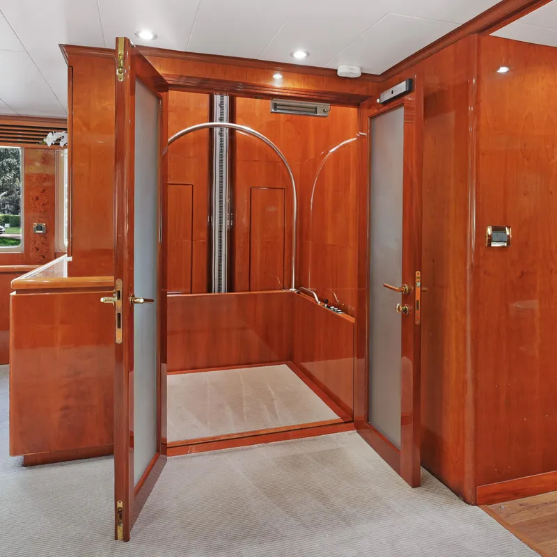 Slide: The Image of Luxurious wooden interior of 2003 Hargrave Sky Lounge yacht with elegant doors and lighting. - 26