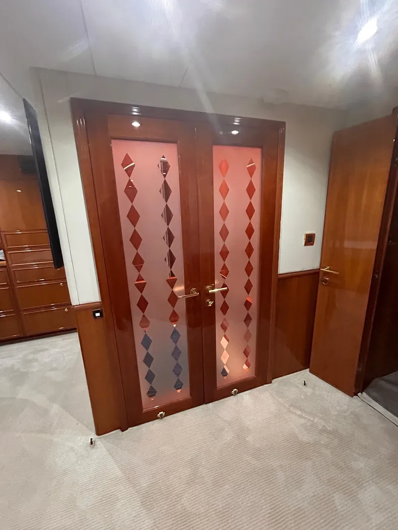 Slide: The Image of Luxurious interior of 2003 Hargrave Sky Lounge yacht with elegant wooden doors. - 32