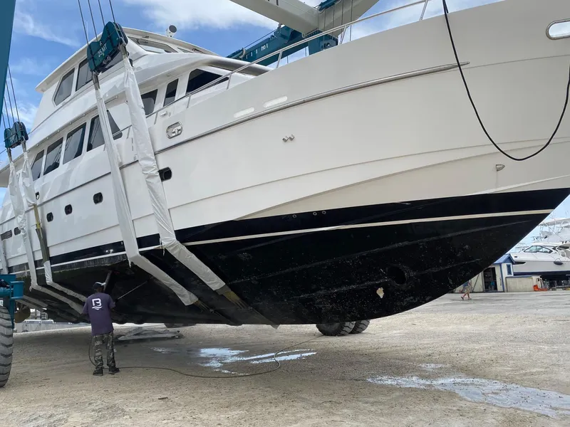 Slide: The Image of 2003 Hargrave Sky Lounge yacht being lifted for maintenance. - 44