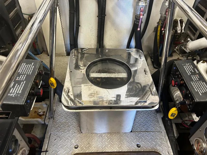 Slide: The Image of Engine room of 2003 Hargrave Sky Lounge yacht with machinery and control panels. - 56