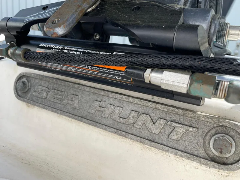 Slide: The Image of 2007 Sea Hunt Triton 207 boat detail with hydraulic steering system. - 24