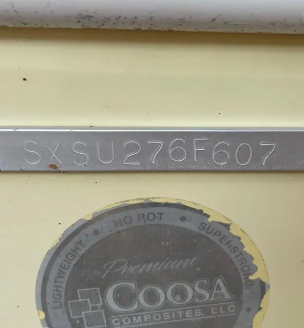 Slide: The Image of Hull identification number on 2007 Sea Hunt Triton 207 boat with Coosa Composites logo. - 26
