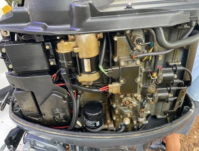 Slide: The Image of Close-up of a 2007 Sea Hunt Triton 207 boat engine components. - 29