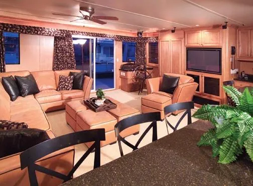 Slide: The Image of Luxurious interior of 2000 Sumerset Houseboat, featuring leather seating and modern amenities. - 5