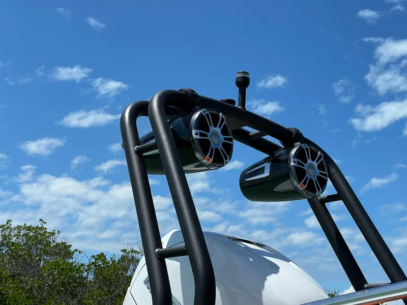 Slide: The Image of 2022 Cranchi 26 Rider boat speakers against a blue sky background. - 39