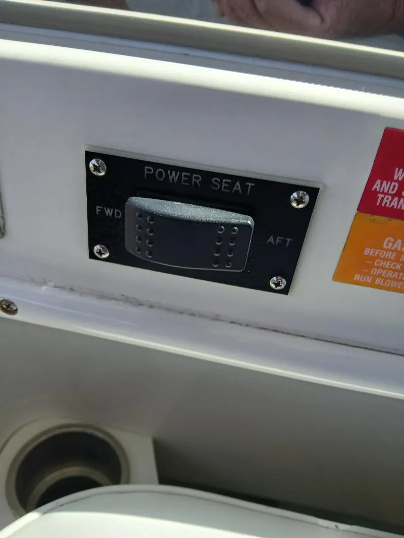 Slide: The Image of Power seat control panel on 1997 Sea Ray 370 Sundancer boat. - 11