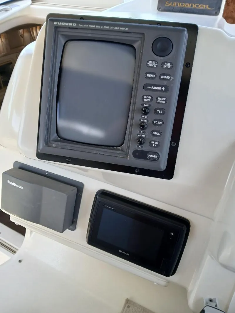 Slide: The Image of Control panel of a 1997 Sea Ray 370 Sundancer boat. - 8