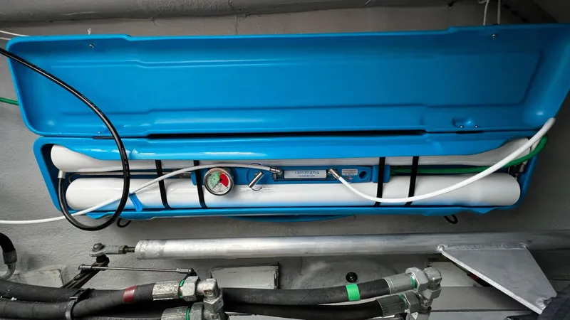 Slide: The Image of Engine room of 2020 Beneteau Swift Trawler 44 with water filtration system. - 20