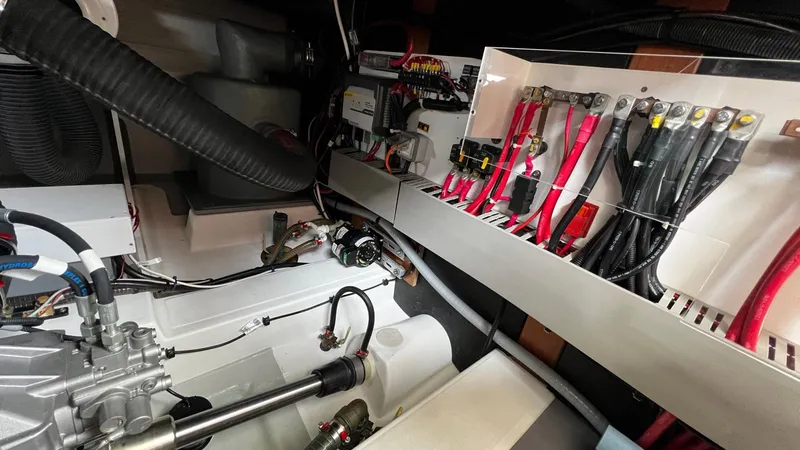 Slide: The Image of Engine room of 2020 Beneteau Swift Trawler 44 with wiring and mechanical components. - 32