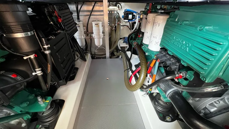 Slide: The Image of Engine room of 2020 Beneteau Swift Trawler 44 with Volvo Penta engines. - 34