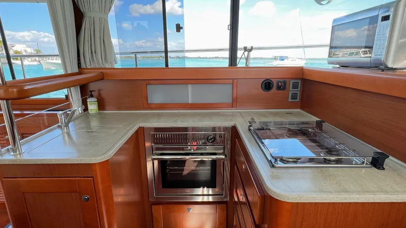 Slide: The Image of Modern kitchen interior on 2020 Beneteau Swift Trawler 44 yacht. - 46
