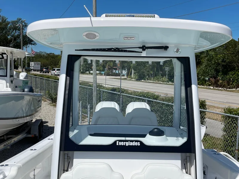 Slide: The Image of 2024 Everglades 285CC boat, front view, showcasing sleek design and windshield. - 20