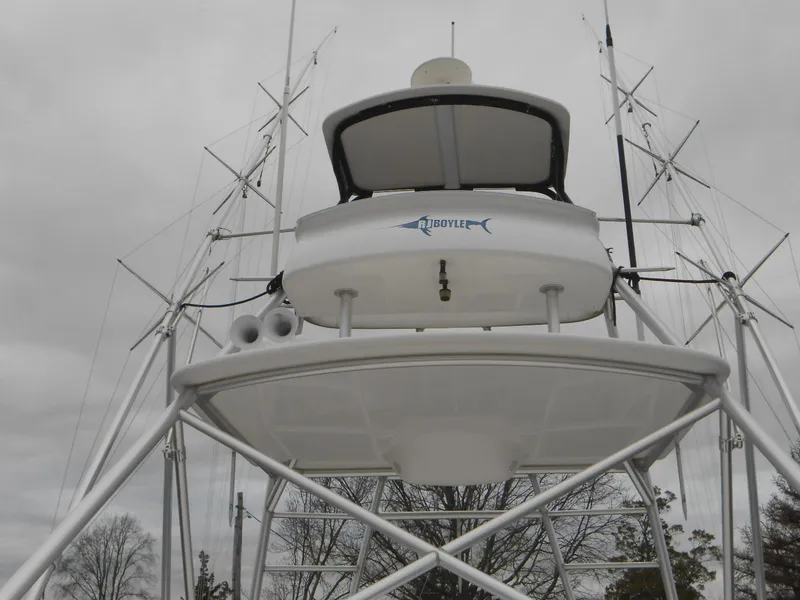 Slide: The Image of 2007 Viking Boats 52 Open tower with antennas against cloudy sky. - 10