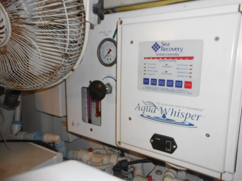 Slide: The Image of 2007 Viking Boats 52 Open watermaker system, featuring Sea Recovery Aqua Whisper control panel. - 18