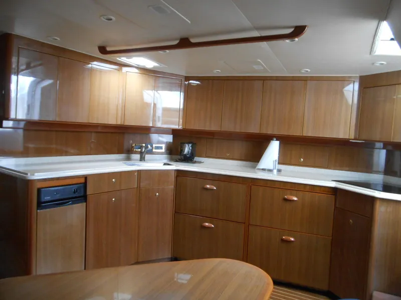 Slide: The Image of Luxurious wooden kitchen interior of 2007 Viking Boats 52 Open yacht. - 26