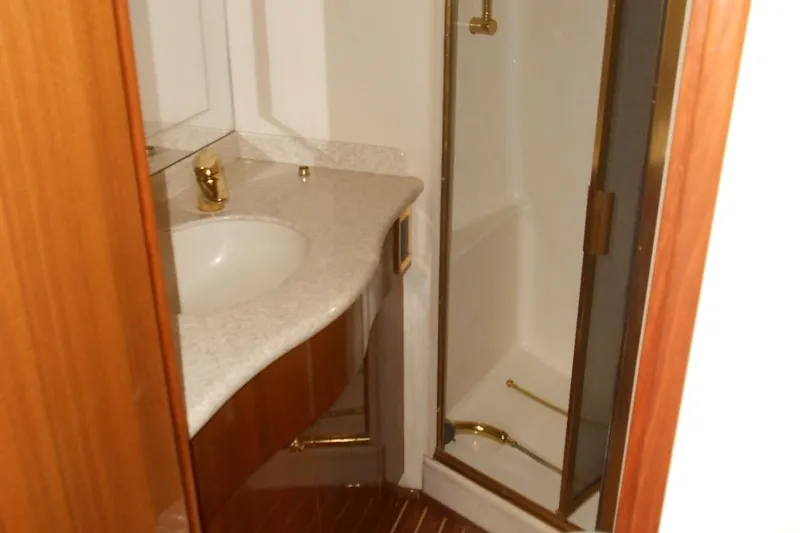 Slide: The Image of Luxurious bathroom in 2007 Viking Boats 52 Open yacht with elegant fixtures. - 35