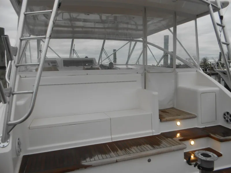 Slide: The Image of 2007 Viking Boats 52 Open yacht with spacious deck and seating area. - 5