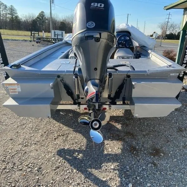 Slide: The Image of 2023 Xpress XP185 Catfish boat with 90 HP outboard motor, rear view on gravel. - 7