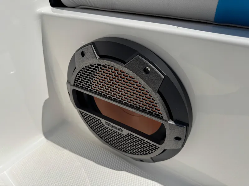 Slide: The Image of 2019 MasterCraft X24 boat speaker with metallic grille on white surface. - 33