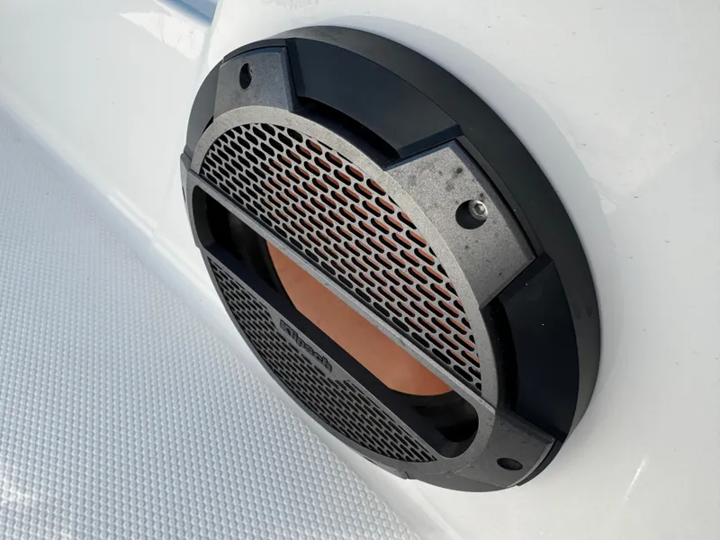 Slide: The Image of Close-up of a speaker on a 2019 MasterCraft X24 boat. - 34