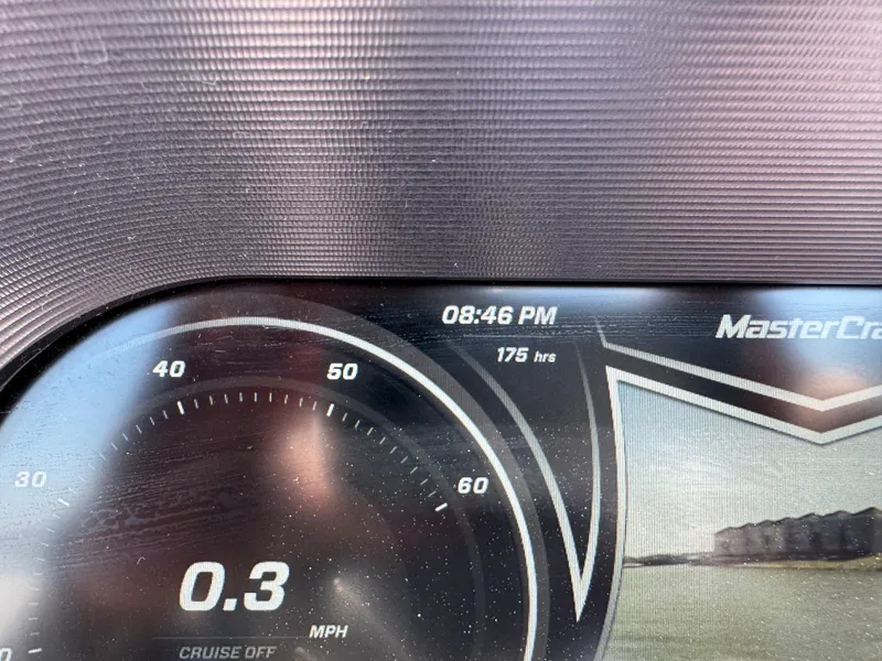 Slide: The Image of Dashboard of 2019 MasterCraft X24 showing 0.3 MPH and 175 hours. - 35