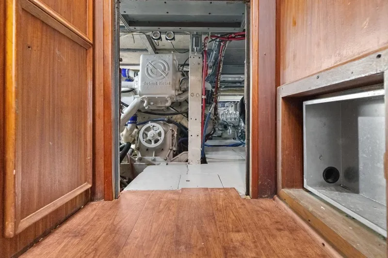 Slide: The Image of Engine room of 1978 Hatteras 45 Convertible yacht with Detroit Diesel engine. - 59