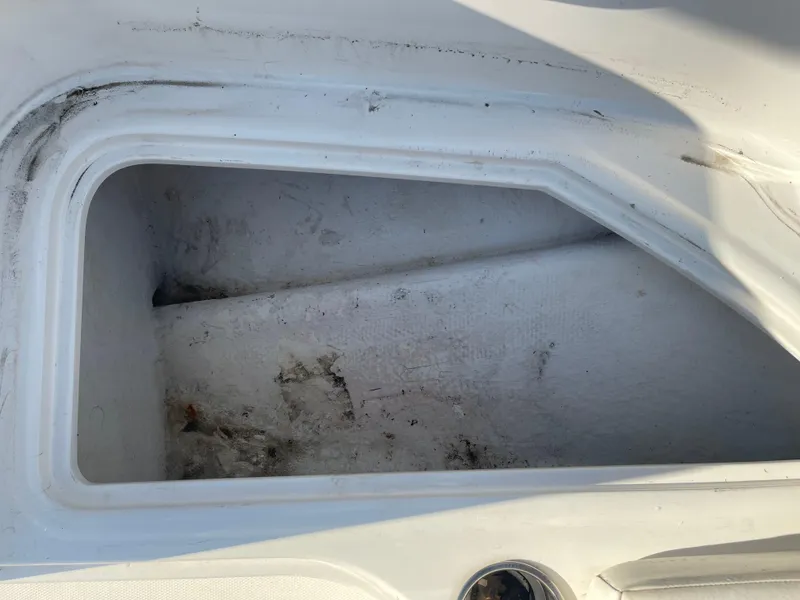 Slide: The Image of Storage compartment of a 2017 Bayliner Element E16 boat, showing interior details. - 25