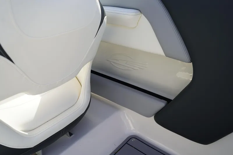 Slide: The Image of 2023 Chaparral 21 SSi OB interior detail with sleek seating and modern design. - 17