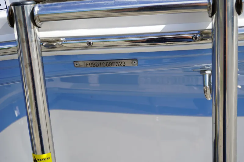 Slide: The Image of 2023 Chaparral 21 SSi OB boat ladder with serial number plate. - 45