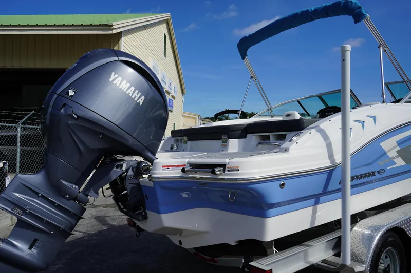 Slide: The Image of 2023 Chaparral 21 SSi OB boat with Yamaha outboard motor on trailer. - 6