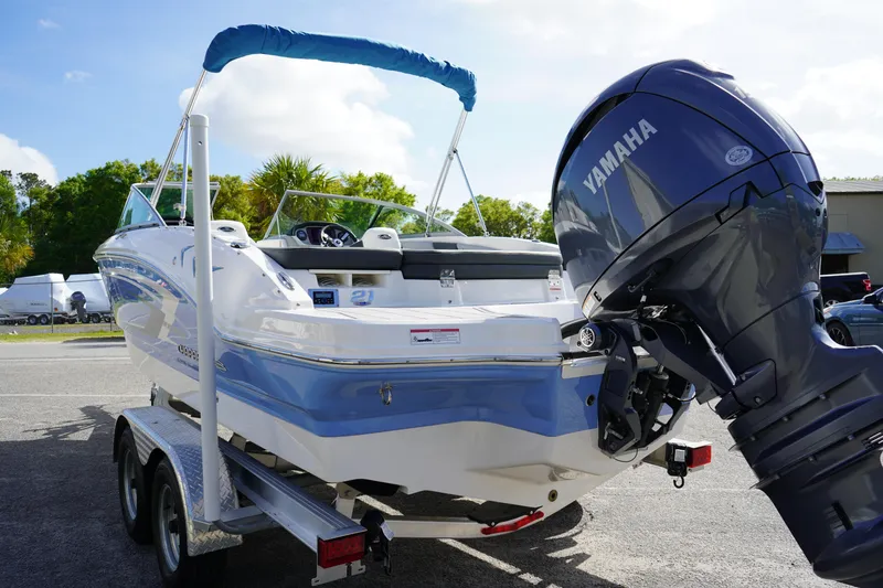 Slide: The Image of 2023 Chaparral 21 SSi OB boat with Yamaha outboard motor on trailer. - 7