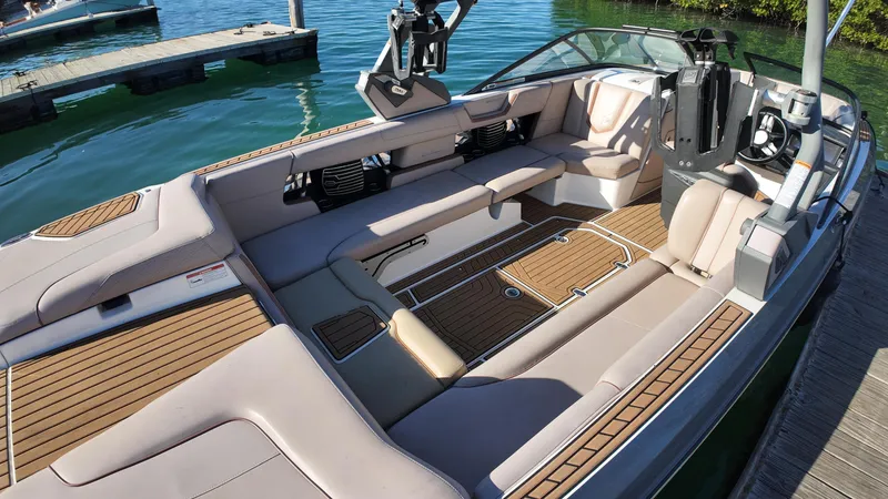 Slide: The Image of 2018 Nautique Super Air Nautique G25 boat interior with spacious seating and modern design. - 43