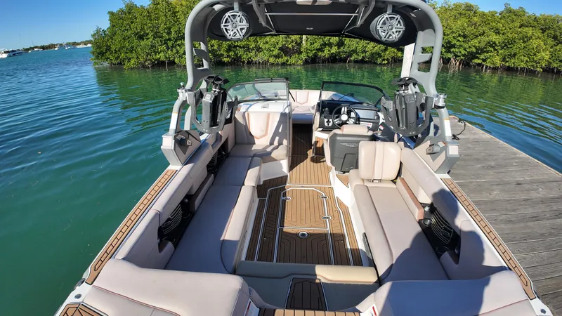 Slide: The Image of 2018 Nautique Super Air Nautique G25 boat interior with spacious seating and modern design. - 44