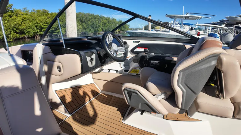 Slide: The Image of 2018 Nautique Super Air Nautique G25 interior with sleek design and modern dashboard. - 47