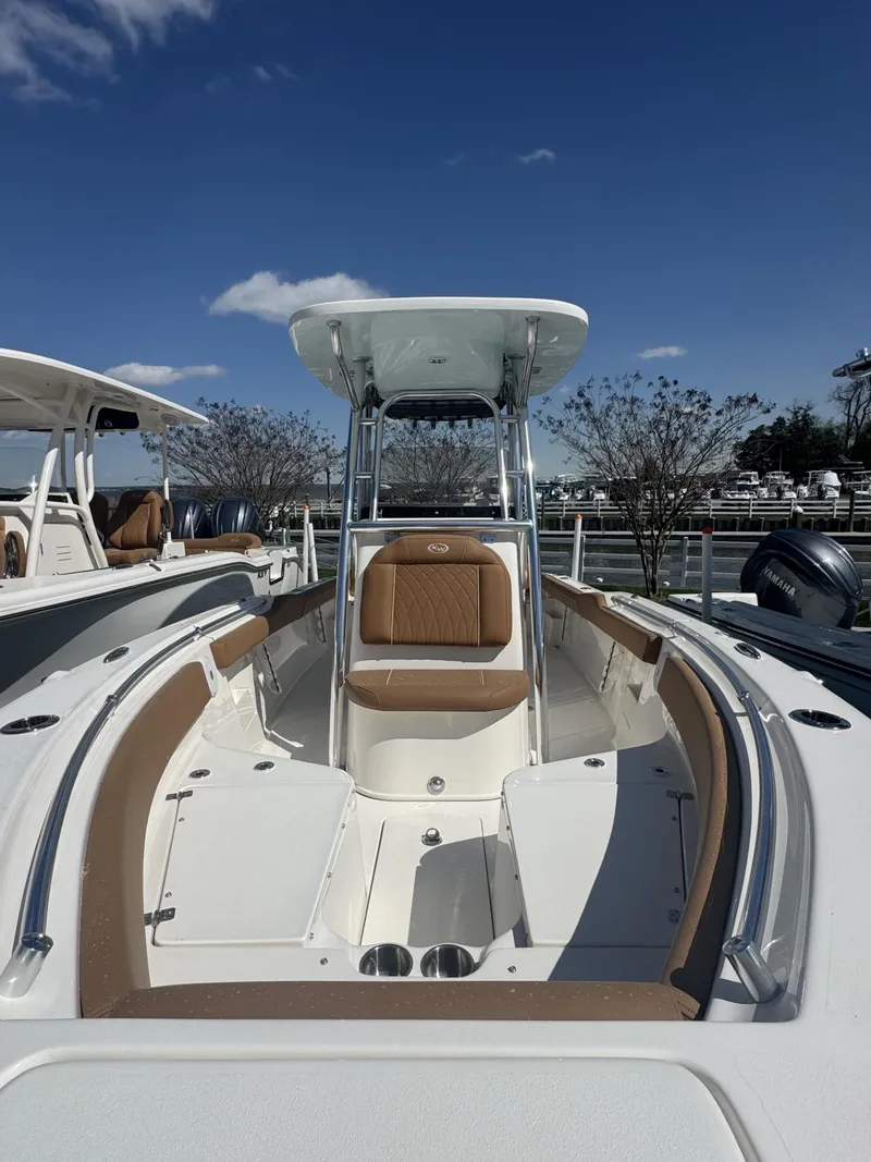 Slide: The Image of 2025 Key West 239 FS boat with sleek design and spacious seating. - 2